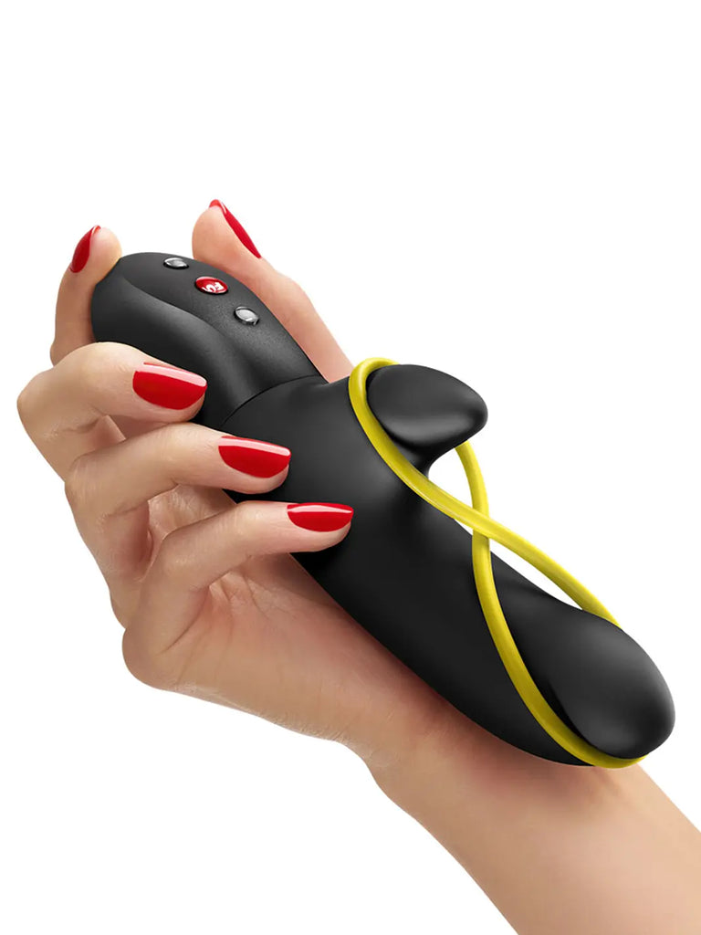 Black FUN FACTORY Amorino held in one hand to demonstrate its compact dual-stimulation design