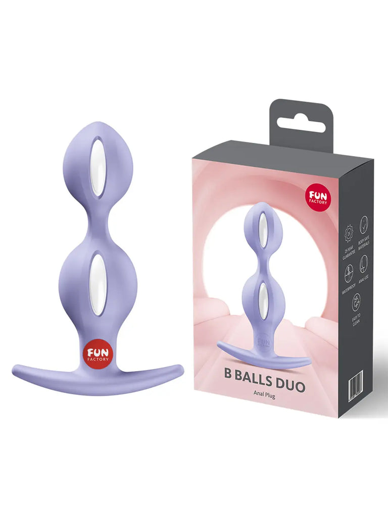 Purple FUN FACTORY B Balls Duo weighted anal beads displayed beside the branded retail packaging