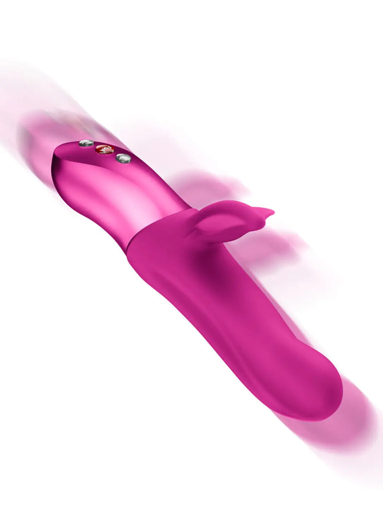 FUN FACTORY Bi Stronic Fusion in magenta motion view showing the curved silicone body and stroking design.