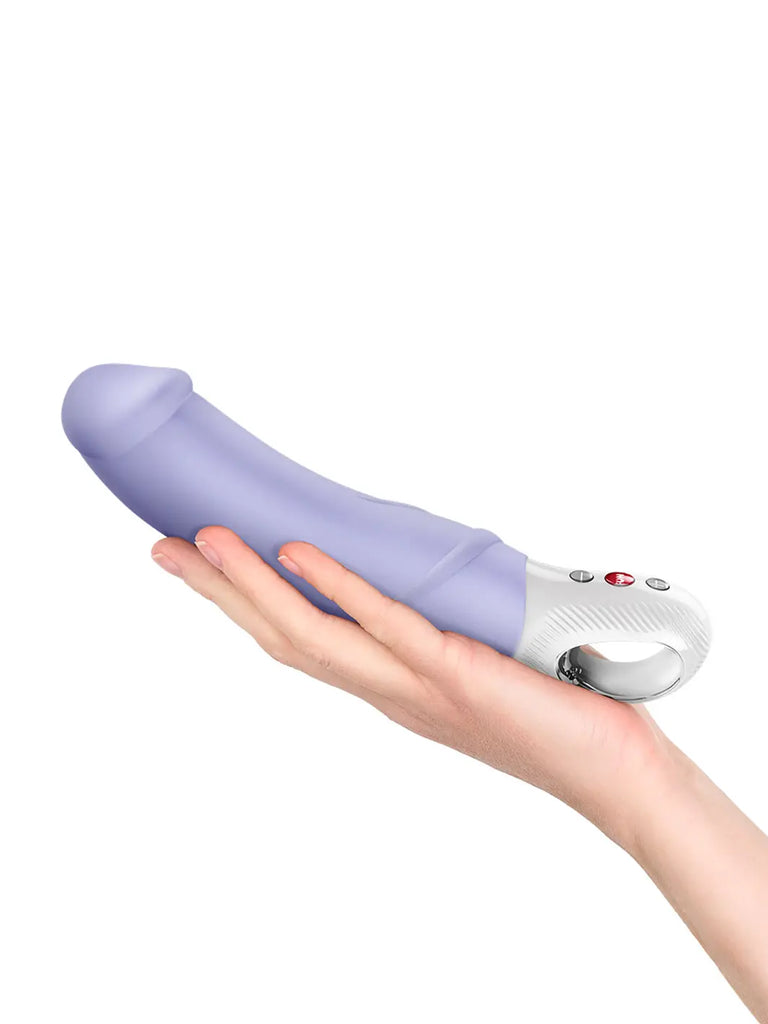 Lilac FUN FACTORY Big Boss G5 held in one hand to show its generous proportions and flexible design