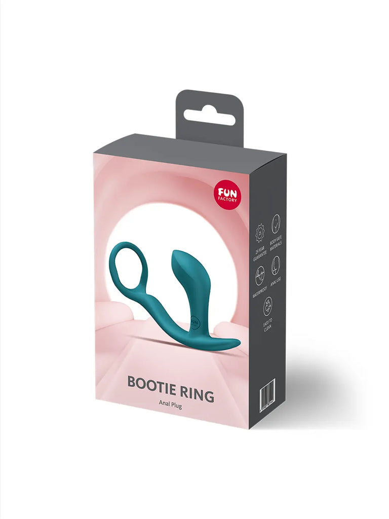 FUN FACTORY Bootie Ring in aquamarine shown in hand with compact curved silicone design and flexible ring.