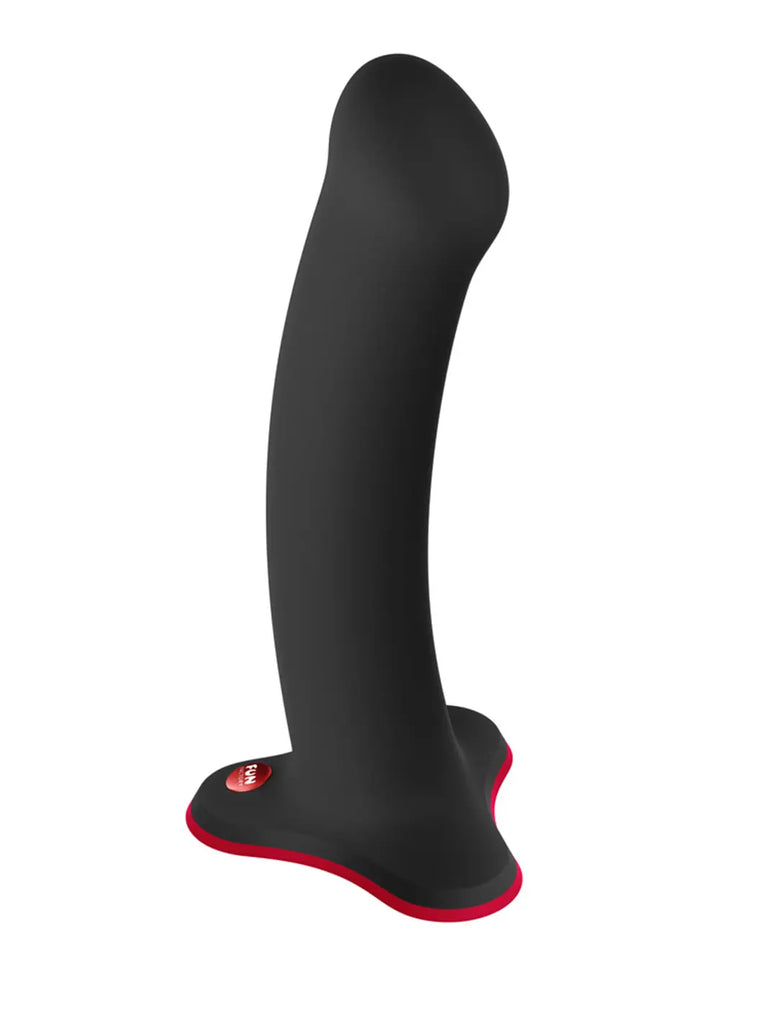 Black FUN FACTORY Magnum silicone dildo with a gently curved shaft and secure low-profile base
