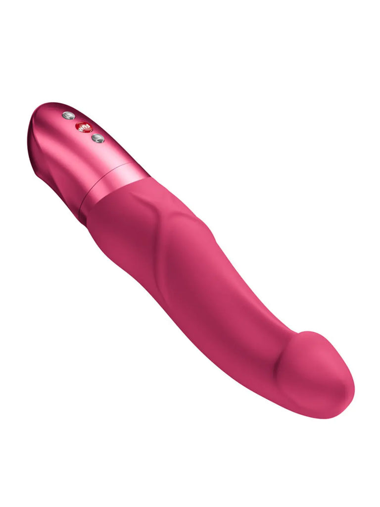 Angled view of the raspberry FUN FACTORY Mr Boss highlighting its curved realistic-inspired profile