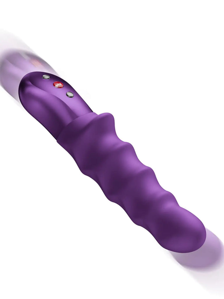FUN FACTORY Stronic Surf in purple angled view highlighting the wave-textured shaft and sleek handle.